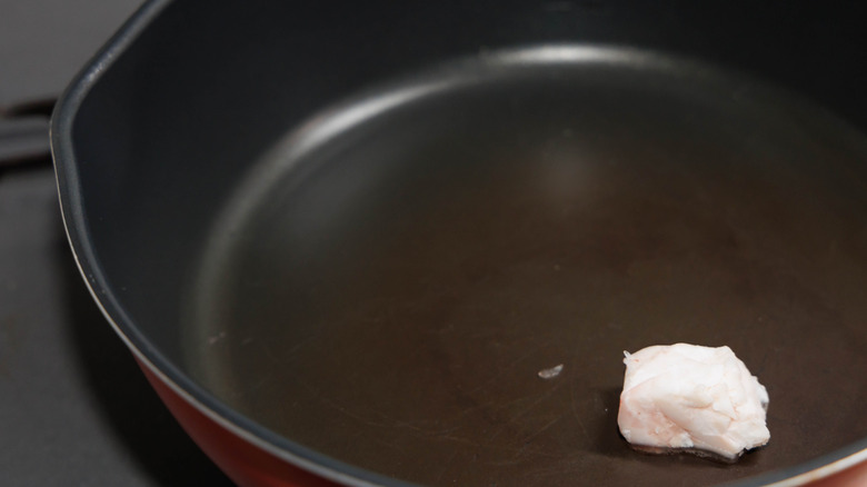 Beef tallow on frying pan