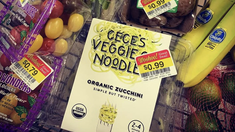 A cart full of produce with Kroger's 