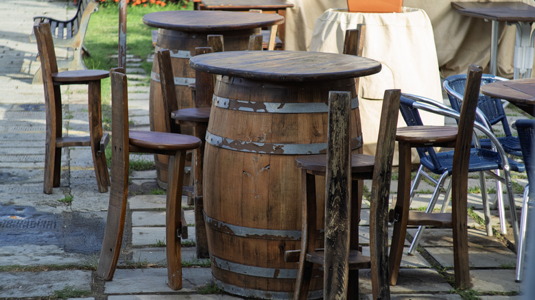 Barrels as pub tables on patio