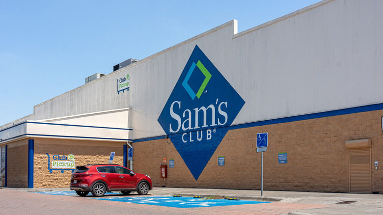 A picture from a Sam's Club parking lot showing its large logo on the side of the store