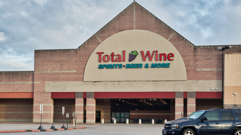 A wide shot from a Total Wine care park showing the entrance to the store