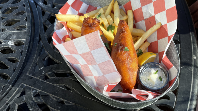 Fish and chips on red and white checkered paper