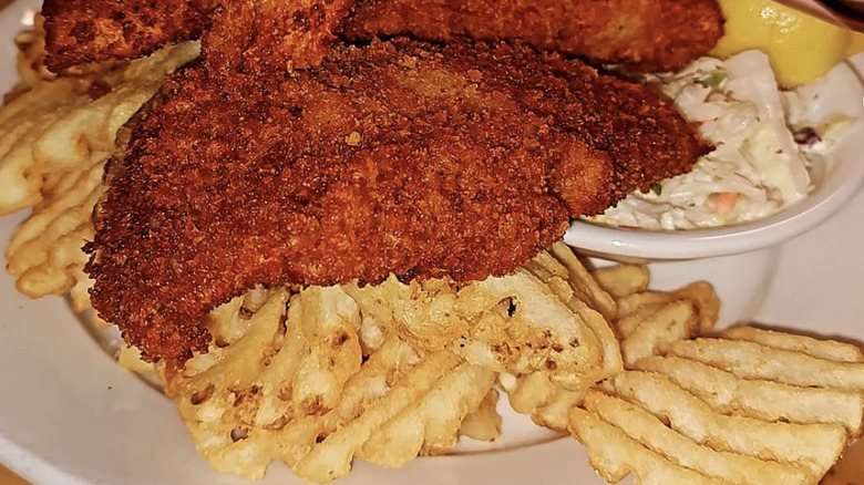 Fish and chips on a white plate