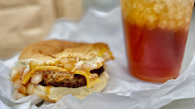 Cheeseburger with drink