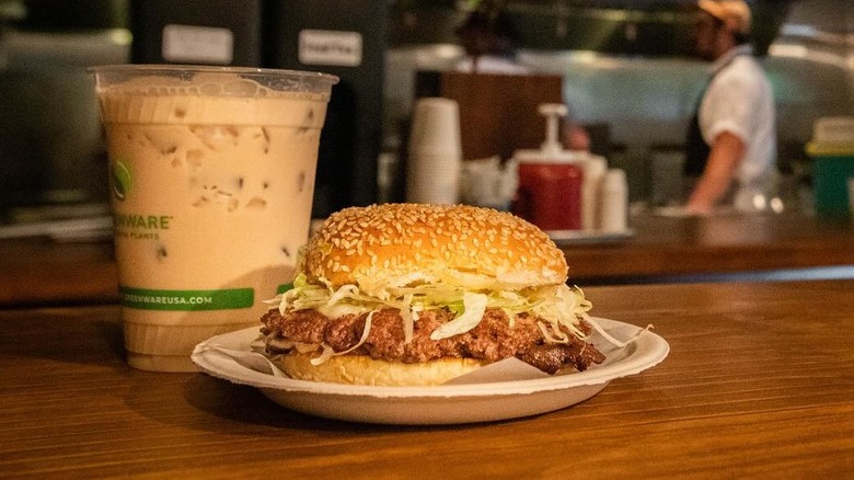 Burger with a drink at There, There