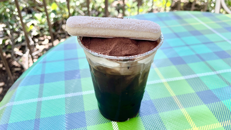 Tiramisu cold brew from Troubadour Tavern on a colorful plaid table