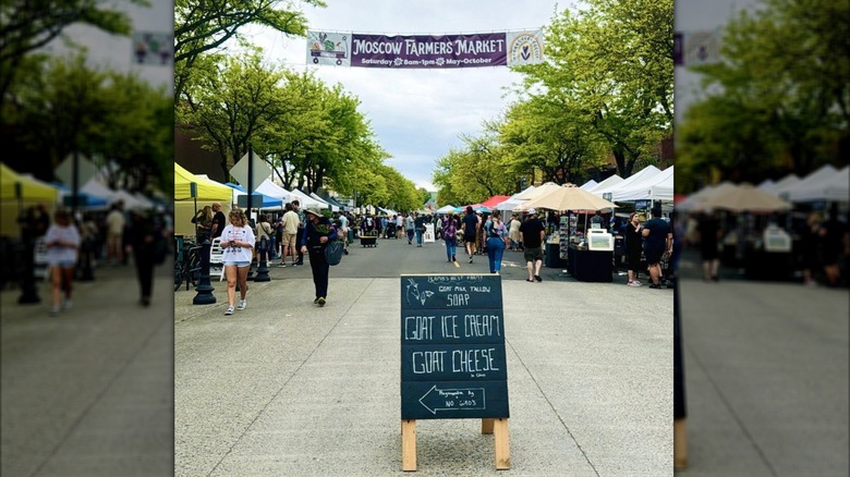Chalkboard advertising goat ice cream and goat cheese at farmers market