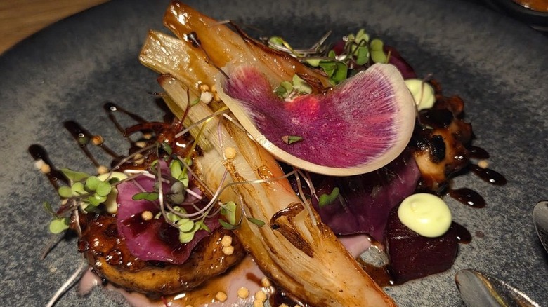 Tawa charred octopus topped with glazed fennel and beet