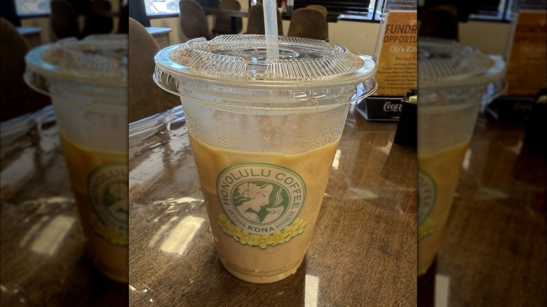 Pumpkin spice latte in plastic to-go cup