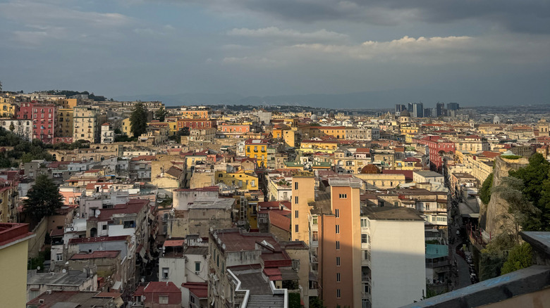 A view of Naples, Italy, showing colorful houses and cramped streets in sunshine