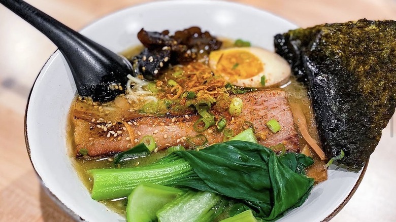 Ramen with pork belly, egg, nori, and black garlic oil
