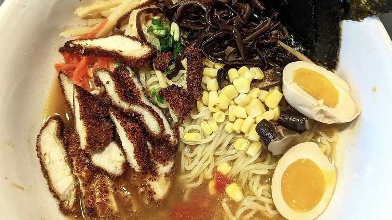 Ramen with soft-boiled eggs and corn