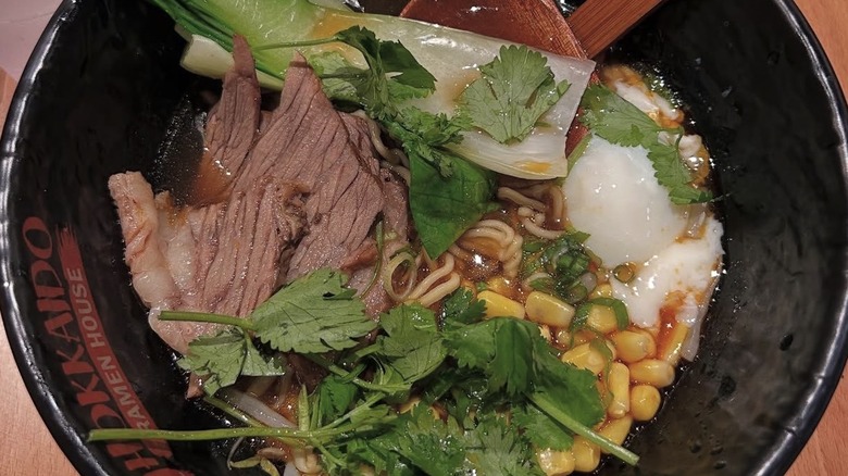Ramen with corn, herbs, bok choy