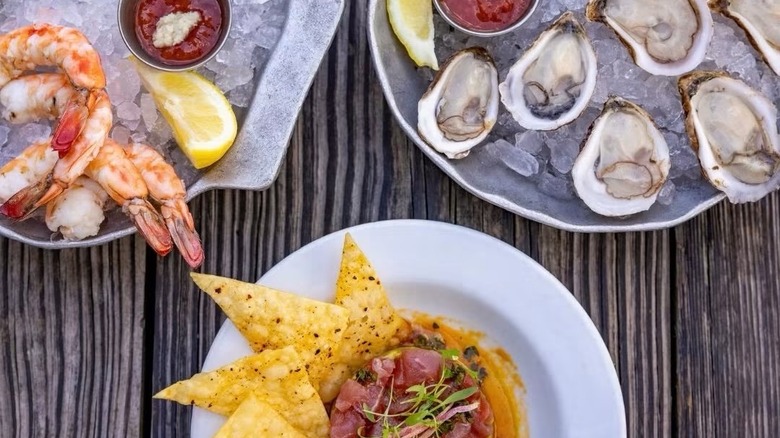 Shrimp cocktails, oysters, and tuna tartare