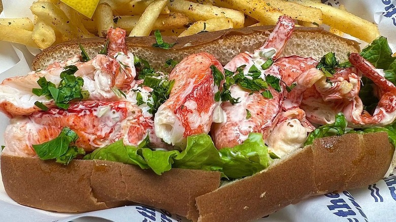 Maine-style lobster roll with french fries at The Current