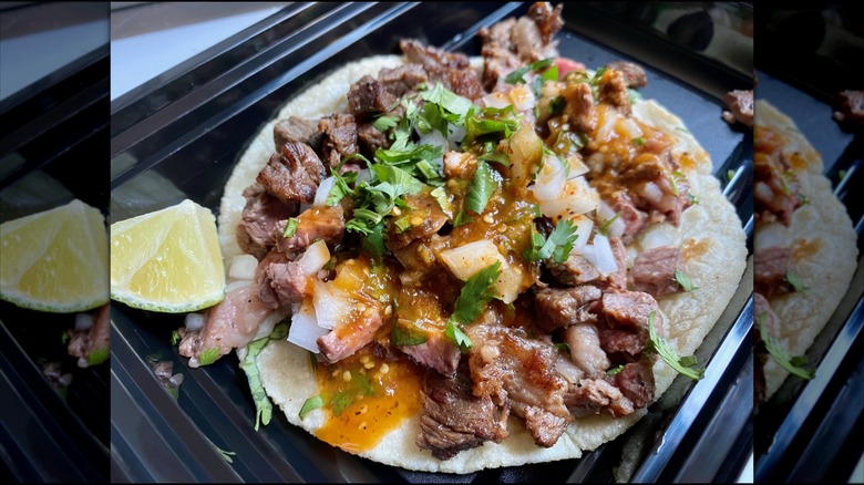 Close-up of a meat taco with salsa