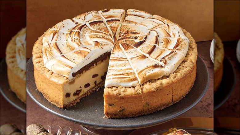S'mores cheesecake on cake tray at Eli's Cheesecake