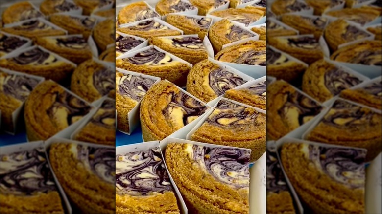 Berry swirl cheesecake quarters on table