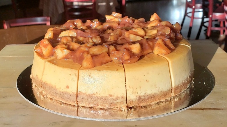 Caramel cheesecake topped with baked apples