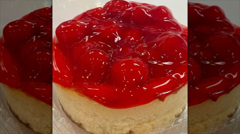Close-up of berry cheesecake with red glaze