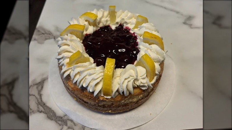 Angled top-down shot of lemon blueberry cheesecake