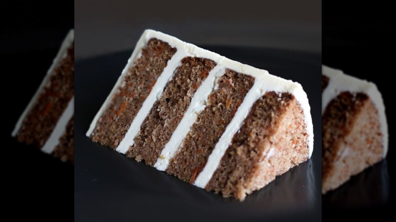 Slice of four-layered, nut-free carrot cake
