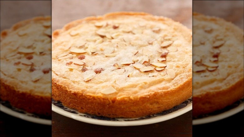 Almond butter cake with sliced almonds scattered on top