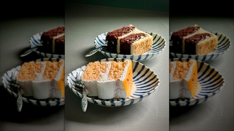 Chantilly and lilikoi cakes on plates with forks