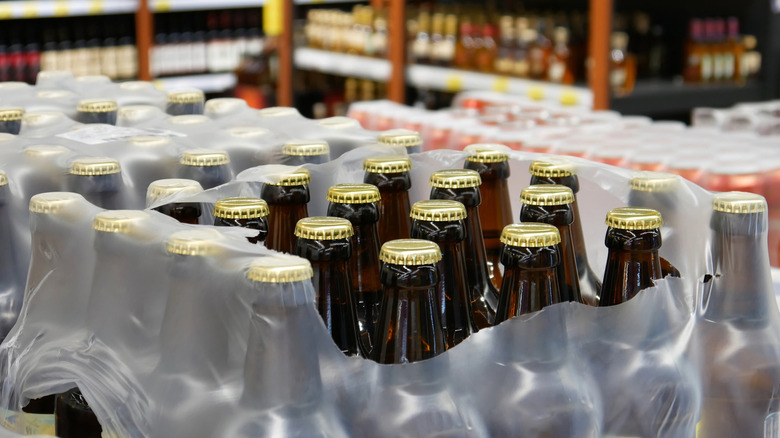csae of beer bottles with plastic packaging opened