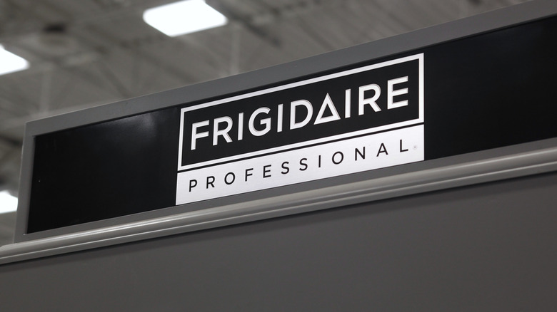 A close up of the Frigidaire logo on an appliance