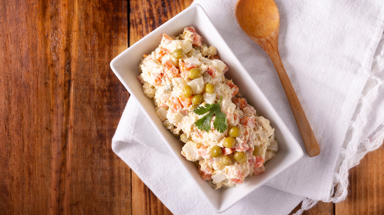 Russian olivier salad in a dish
