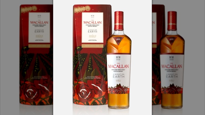 A bottle of The Macallan A Night On Earth In Jerez whisky and box against a white background