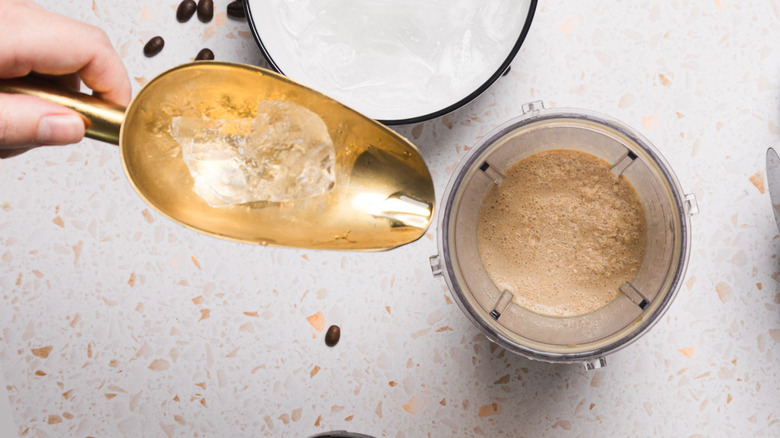 Adding ice to frappe