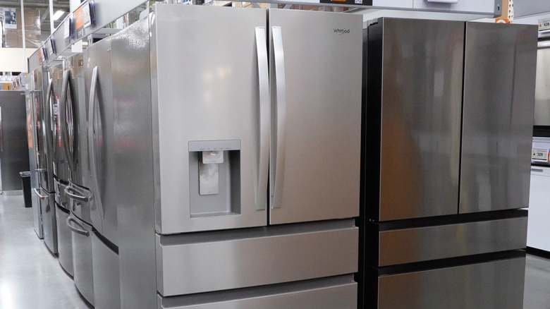 Rows of Whirlpool fridges in a department store