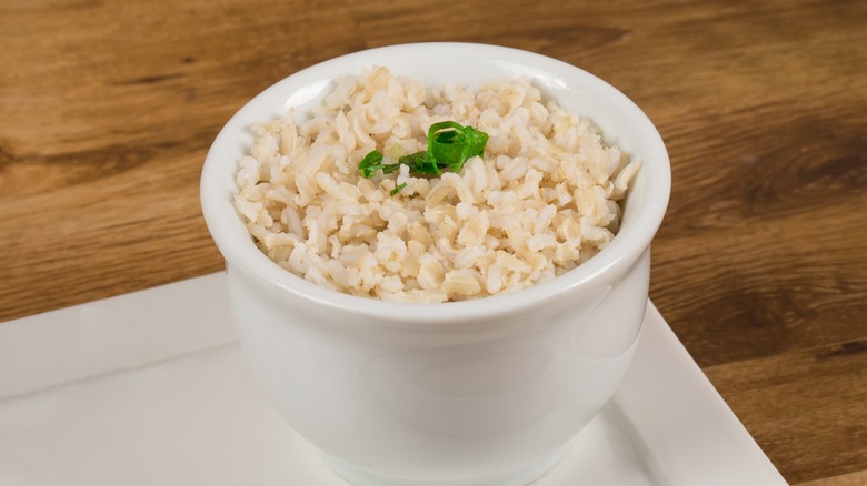brown rice in white bowl