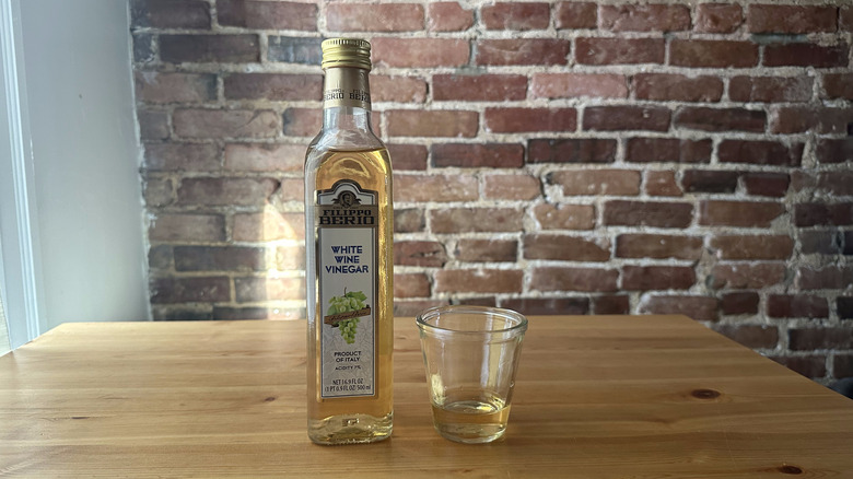 Filippo Berio White Wine Vinegar on wooden table