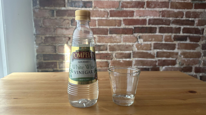 Pompeian Gourmet White Wine Vinegar on wooden table