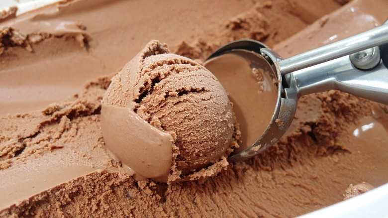 Close-up of chocolate ice cream being scooped