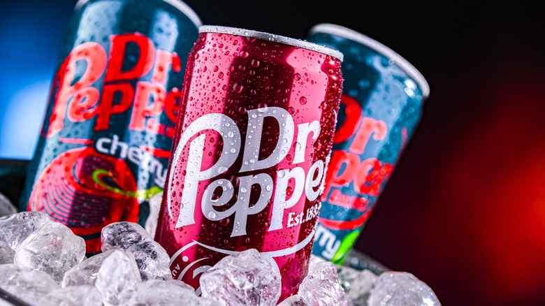 Dr. Pepper cans on ice