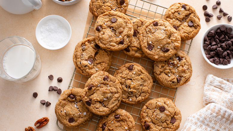 Cookies on a wire rack with other ingredients