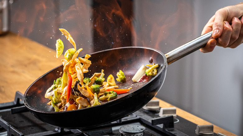 wok stir frying vegetables 