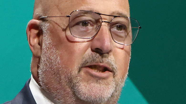Andrew Zimmern in glasses with beard