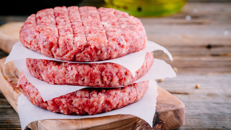 Stack raw fresh burger patties