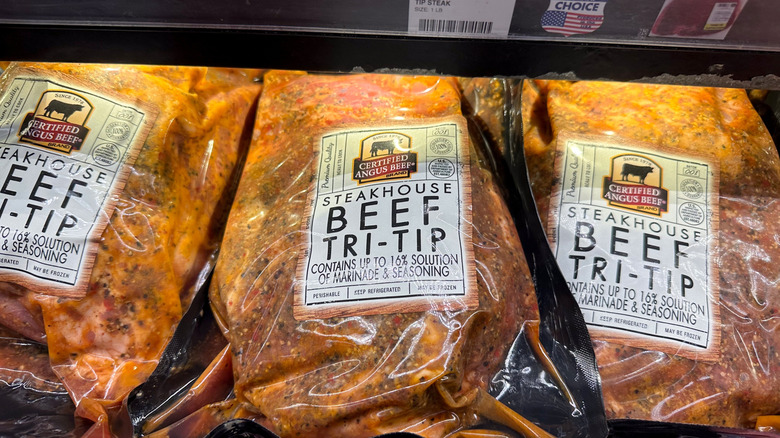 Prepackaged, marinated beef in the refrigerated section
