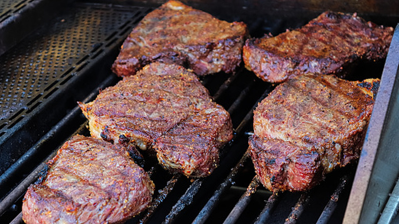 Barbecue pit with cooking meat