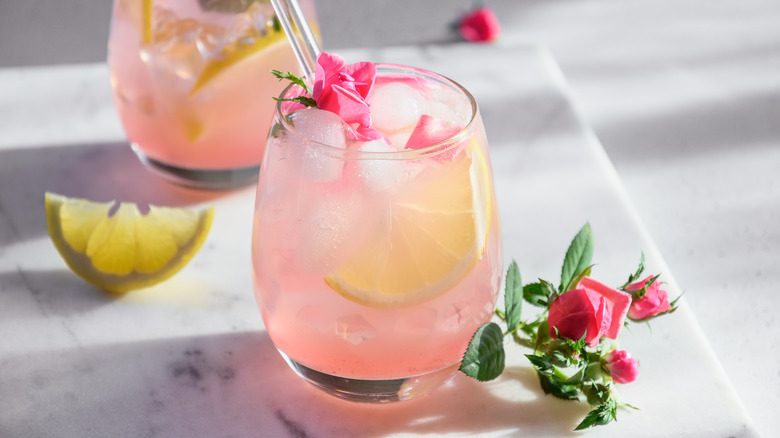 pink non-alcoholic cocktail with flowers