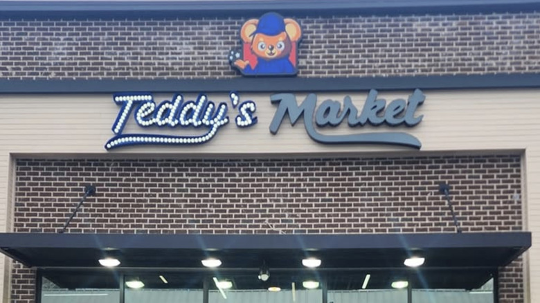 Teddy's Market mascot on a store front