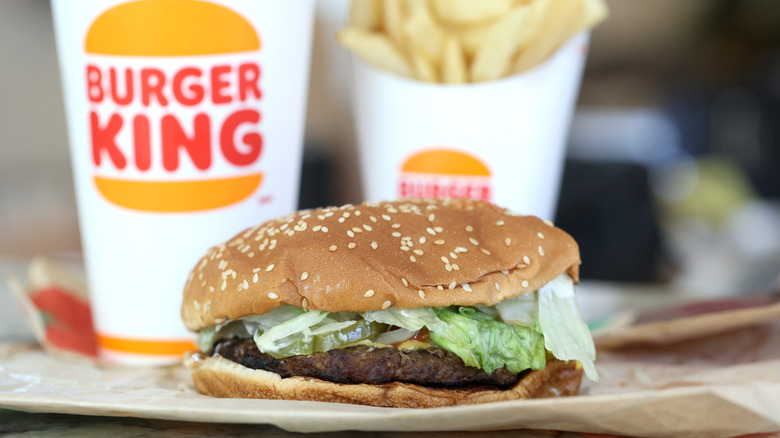 A Burger King Whopper burger served with fries and a drink