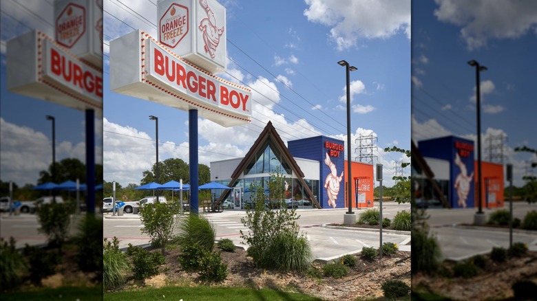 A Burger Boy building with a sign advertising the location