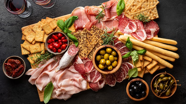 charcuterie board with olives